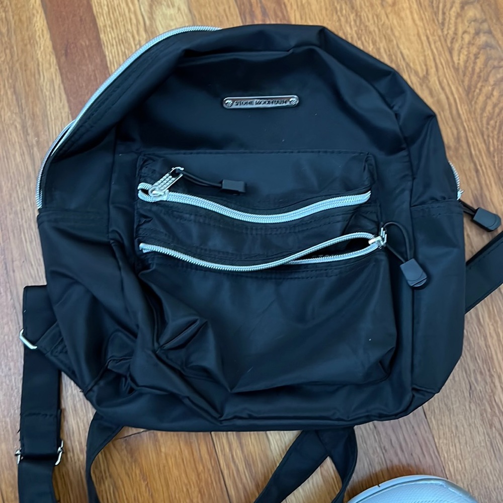 Stone Mountain Microfiber Single Zip Mini Dome Backpack Black w/silver Zipper.
